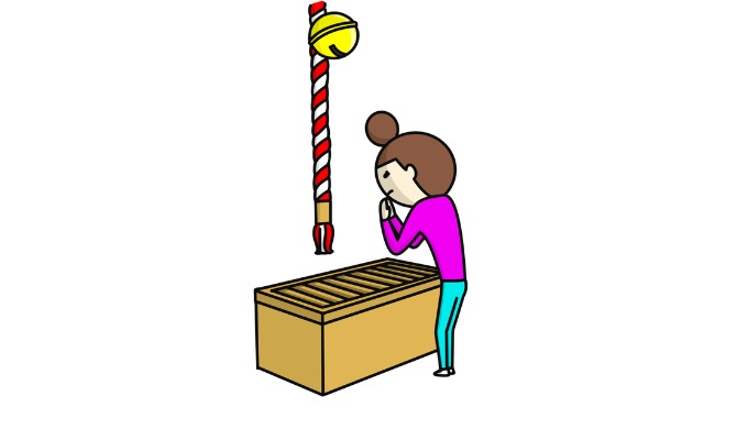 神様にお祈りしている女性