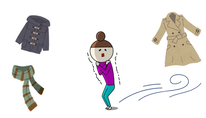 寒がっている女性